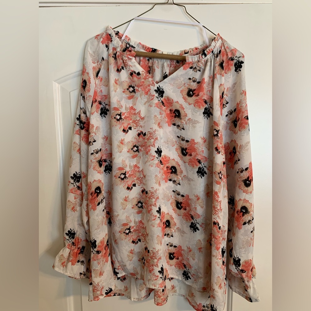 Off white/coral floral blouse size 1X. Sheer fabric, long sleeve w/elastic.